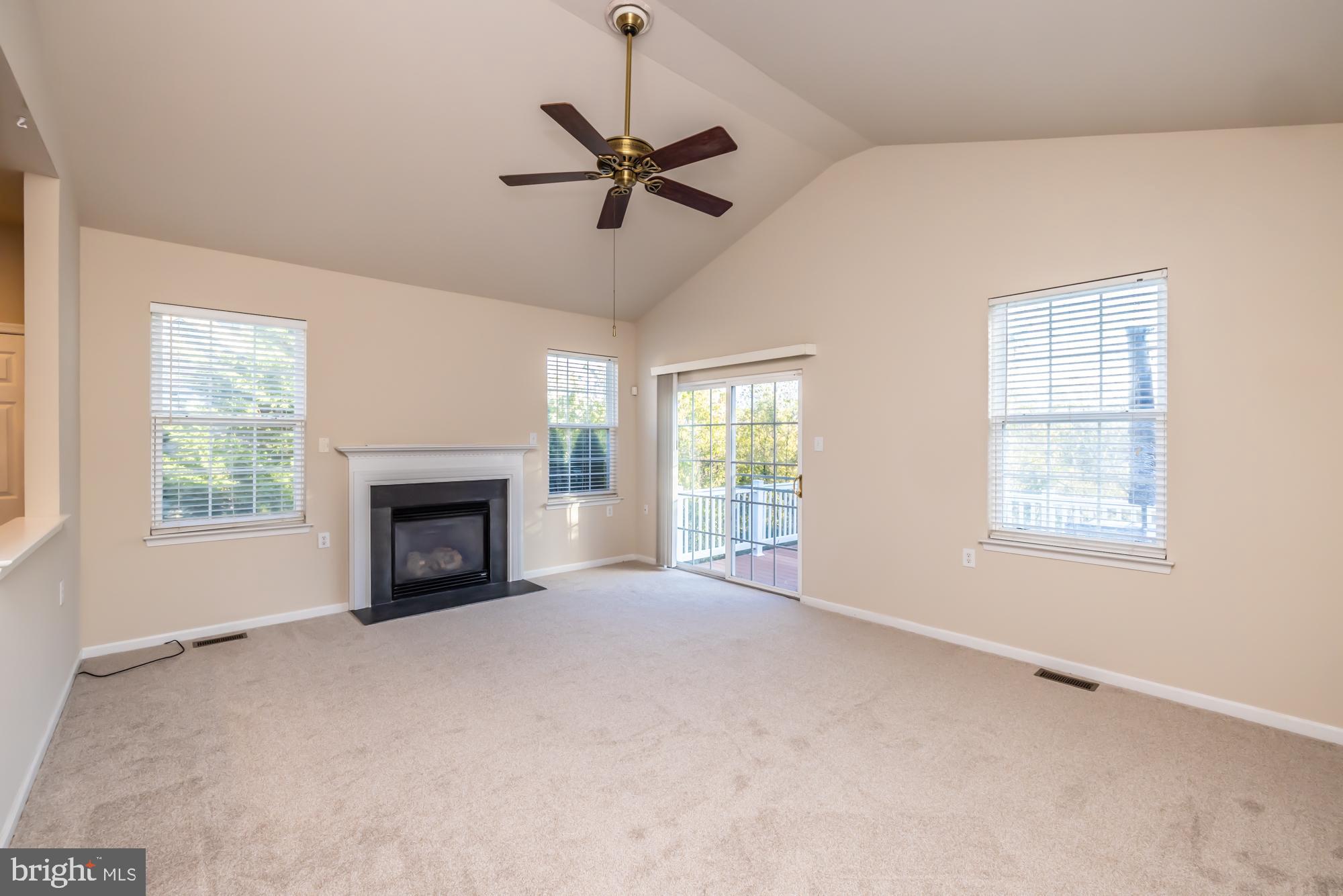 209 Kendig Road Coatesville, PA 19320 - Photo 21 of 47 a view of an empty room with a window and fireplace