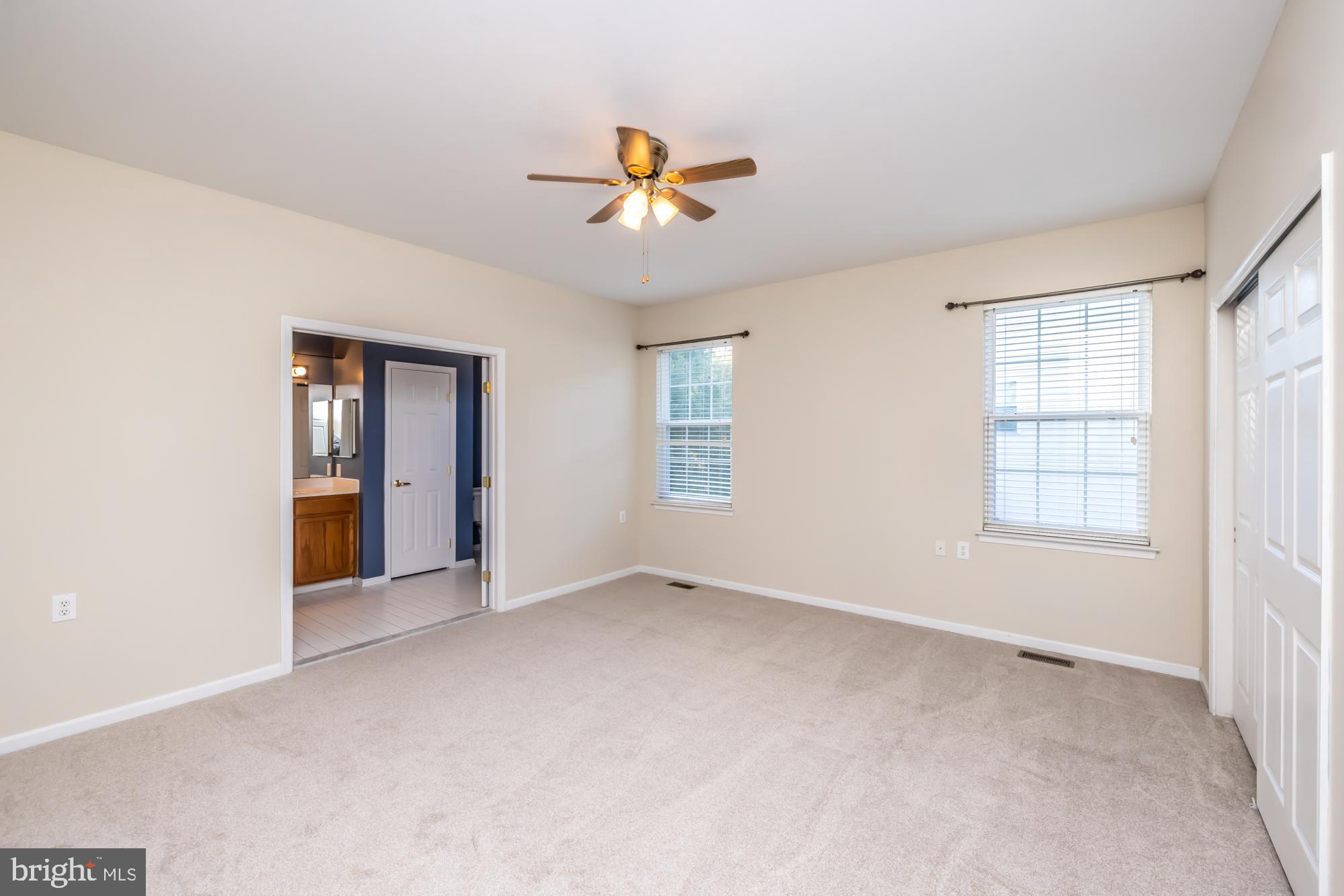 209 Kendig Road Coatesville, PA 19320 - Photo 25 of 47 an empty room with windows and cabinet