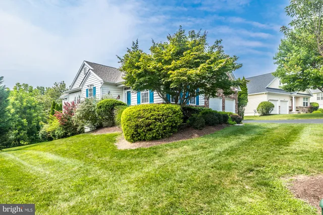 a view of a wooden deck with a bench