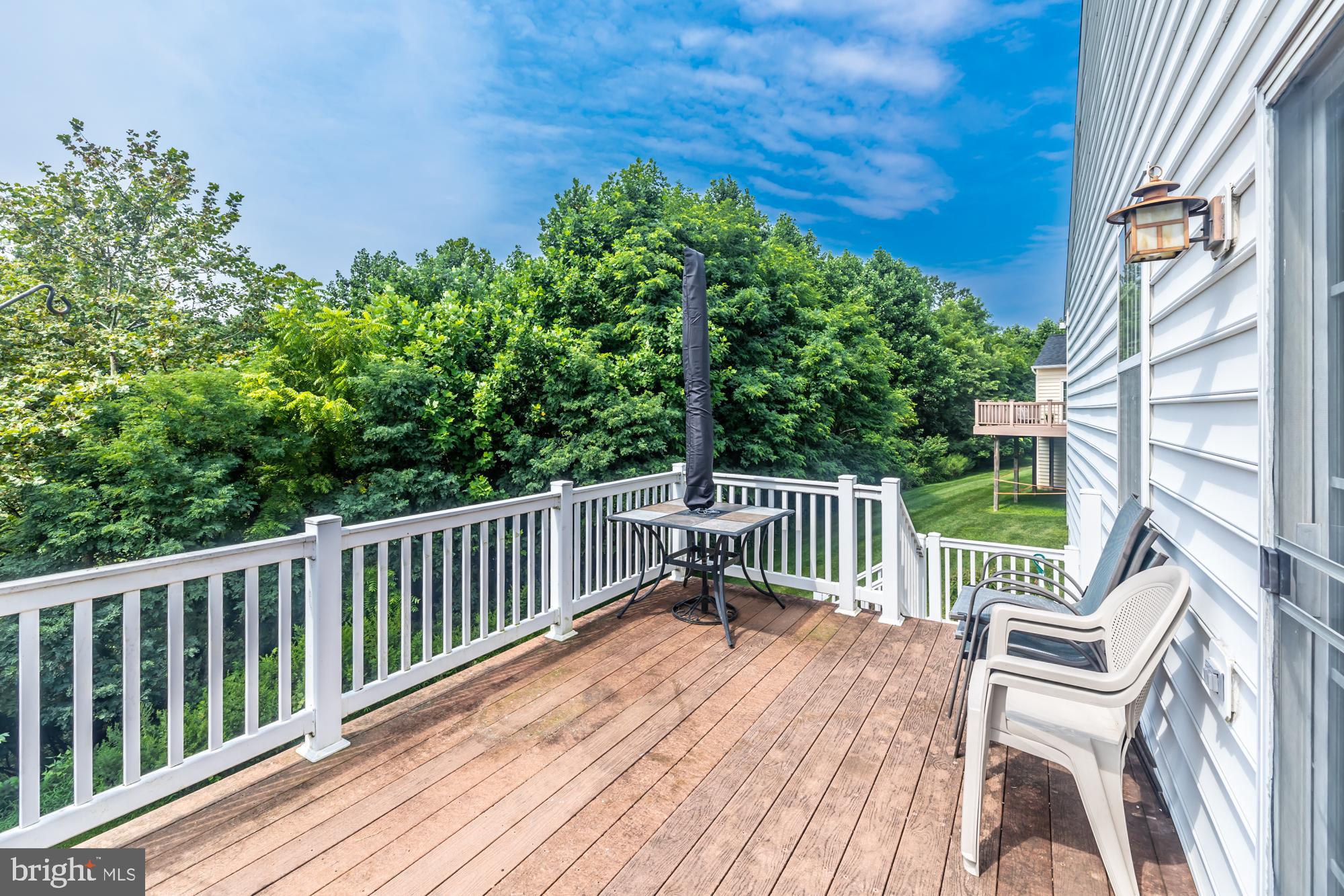 209 Kendig Road Coatesville, PA 19320 - Photo 39 of 47 a view of a wooden deck with a bench