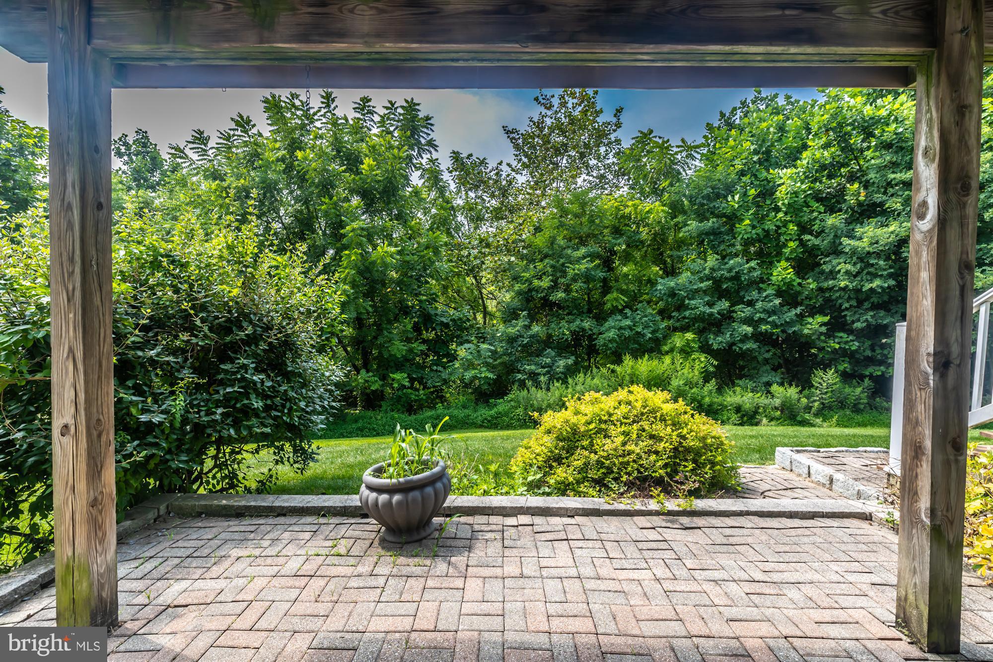 209 Kendig Road Coatesville, PA 19320 - Photo 40 of 47 a view of a garden filled with potted plants