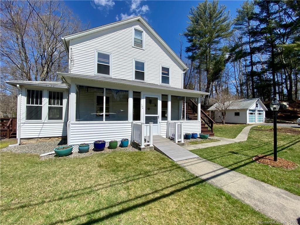 164 Packer Road Groton, CT 06355 - Photo 1 of 1 a front view of a house with a yard