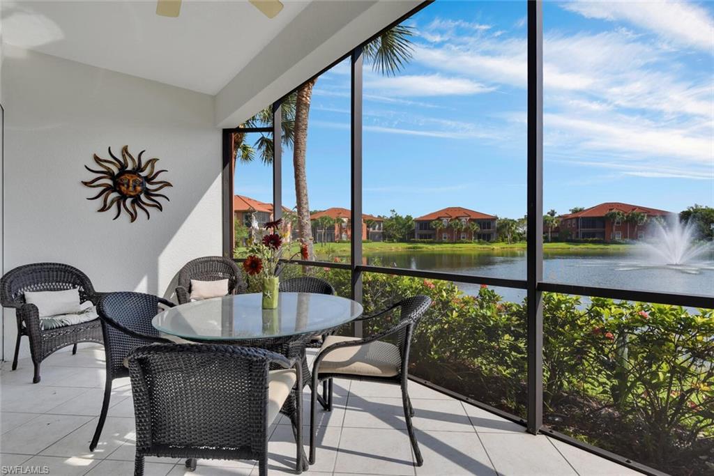 6413 Legacy Circle, Unit 1602 Naples, FL 34113 - Photo 29 of 34 a view of a dining room with furniture and window