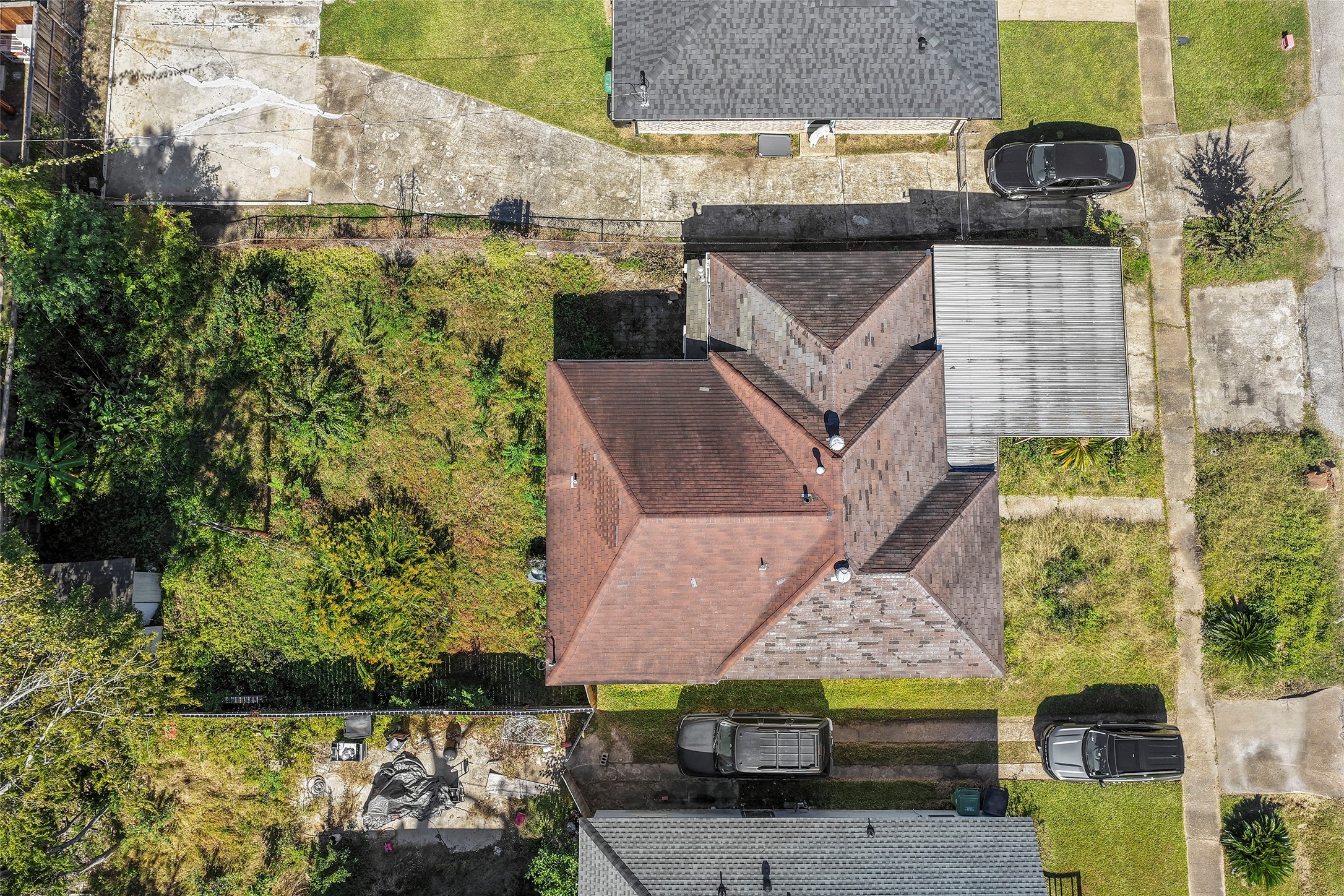 an aerial view of a house with a garden
