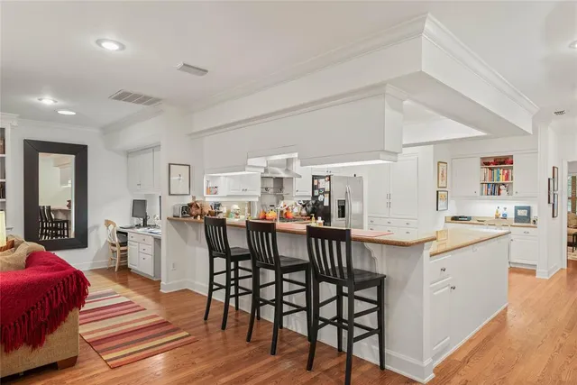 a view of a dining room kitchen and furniture