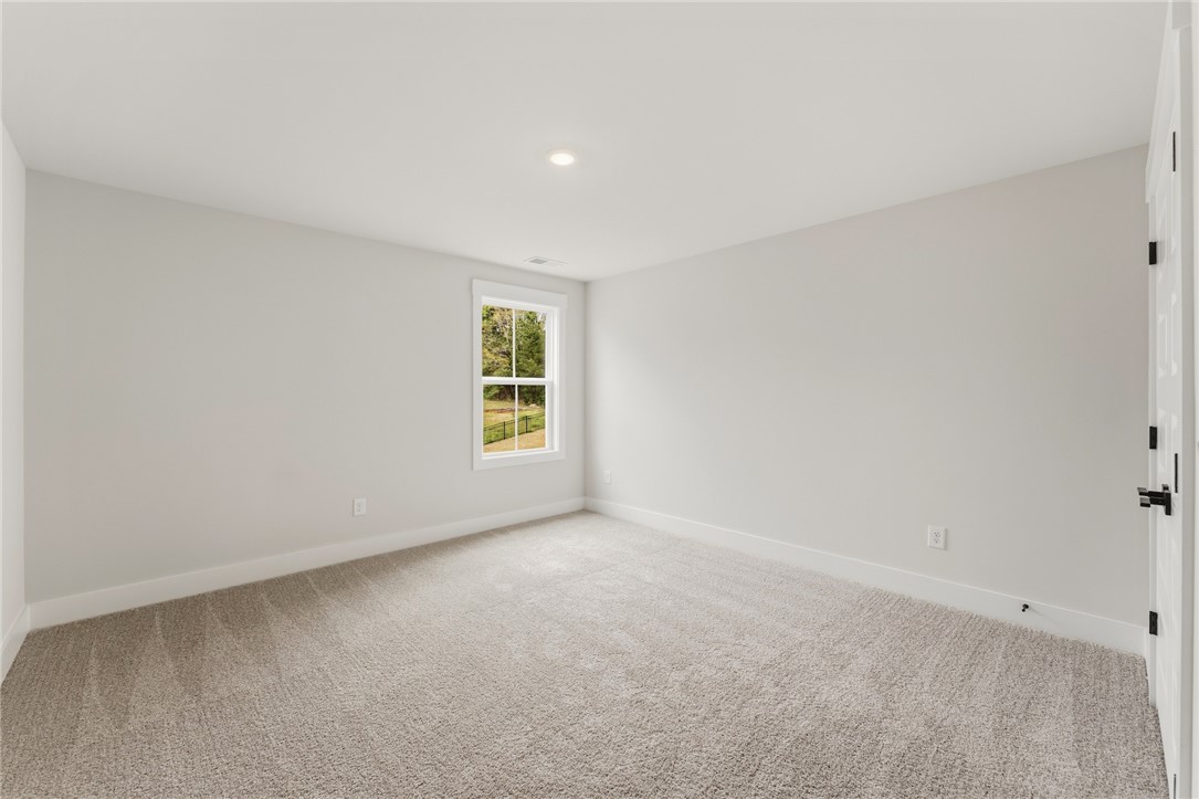 319 Summerall Drive Anderson, SC 29621 - Photo 26 of 37 Bright and airy room with a window offering views of the outdoors.