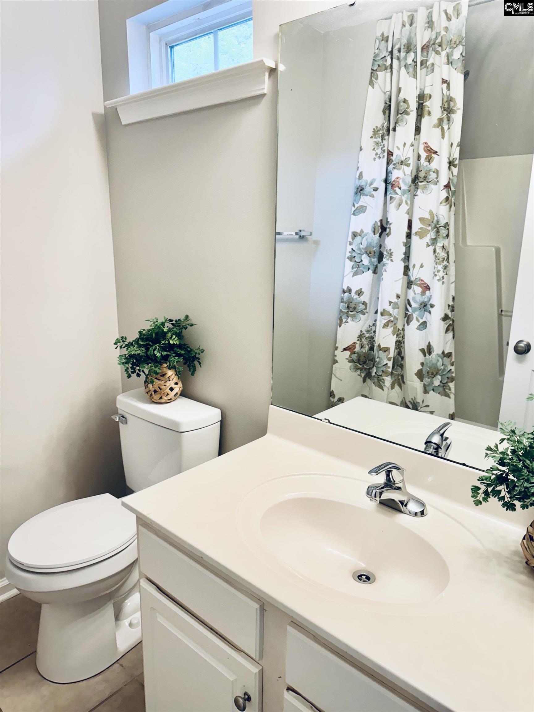 108 Tuscany Court Irmo, SC 29063 - Photo 9 of 13 a bathroom with a sink toilet and shower