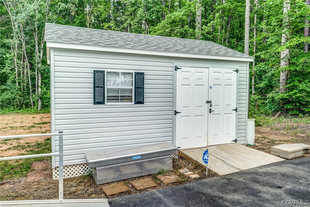 2672 Fredericks Hall Road Mineral, VA 23117 - Photo 36 of 44 a view of a house with a backyard