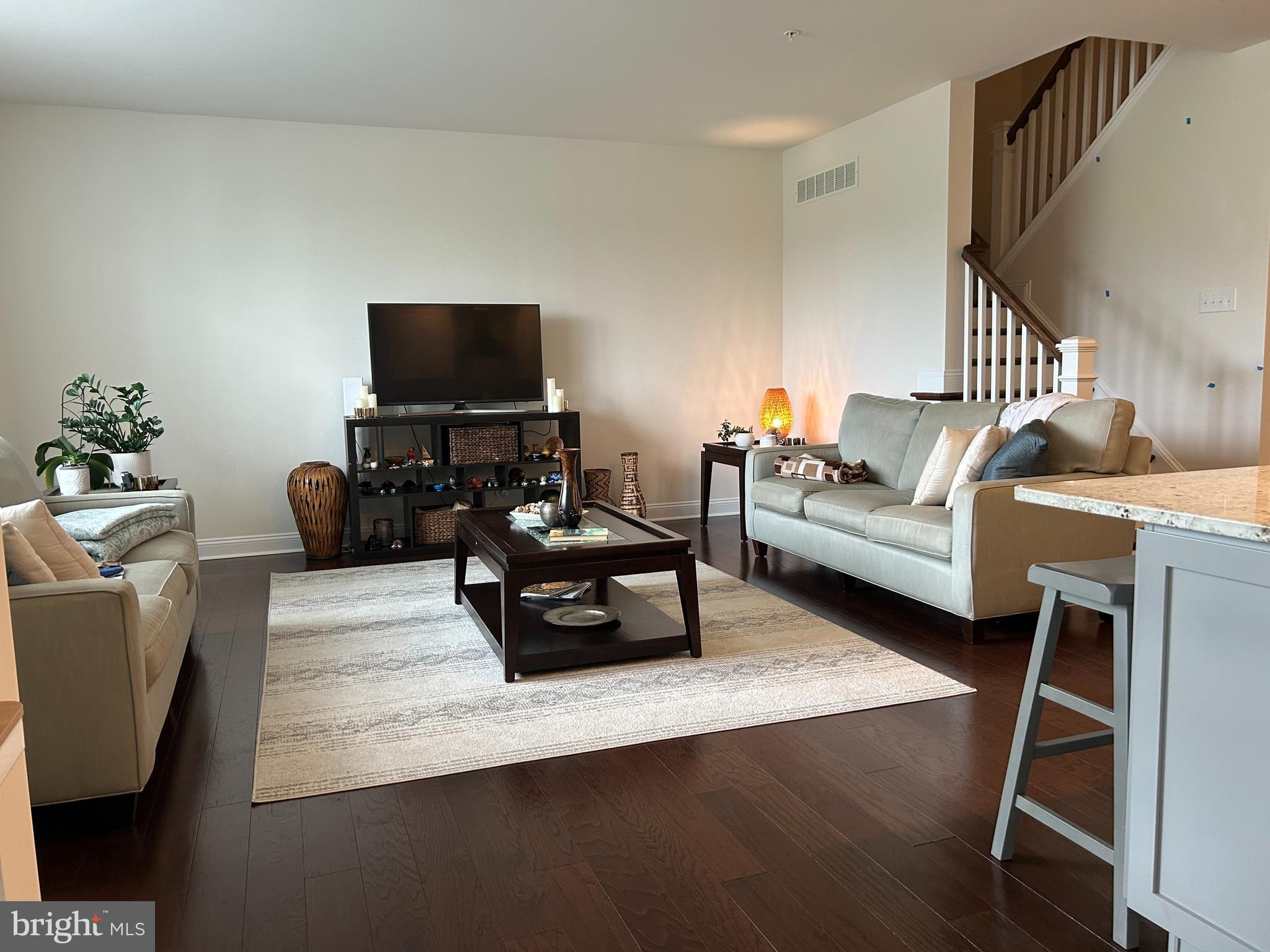 21 Midsummer Drive Newtown Square, PA 19073 - Photo 5 of 11 a living room with furniture and a flat screen tv