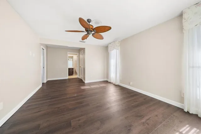 a view of an empty room and window