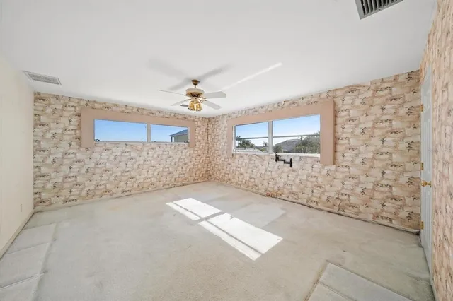 a view of a house with backyard