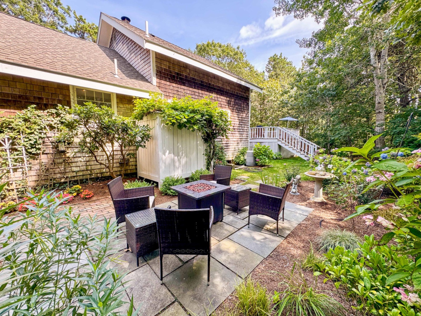 58 Rd To The Plaines Edgartown, MA 02539 - Photo 3 of 40 a view of backyard with outdoor seating and green space