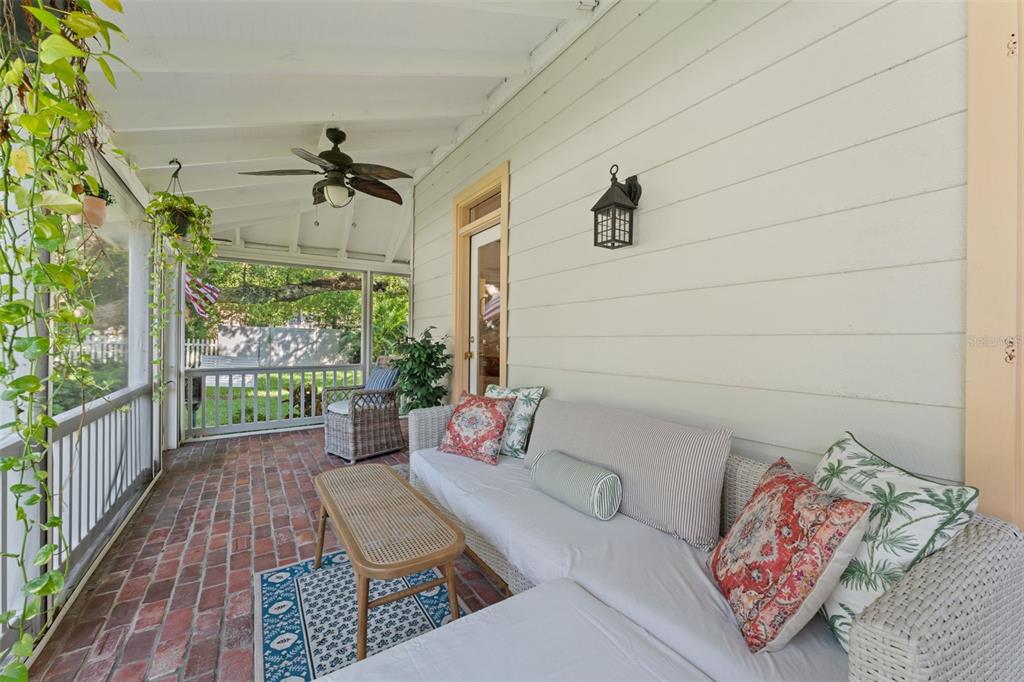 429 Scotland Street Dunedin, FL 34698 - Photo 17 of 78 a outdoor space with the couches and a potted plant