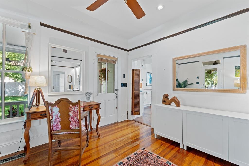 429 Scotland Street Dunedin, FL 34698 - Photo 18 of 78 a living room with furniture and wooden floor