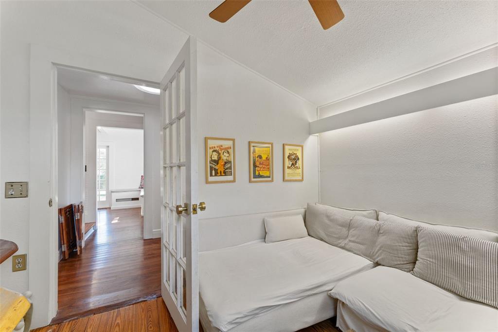 429 Scotland Street Dunedin, FL 34698 - Photo 26 of 78 a living room with furniture and wooden floor