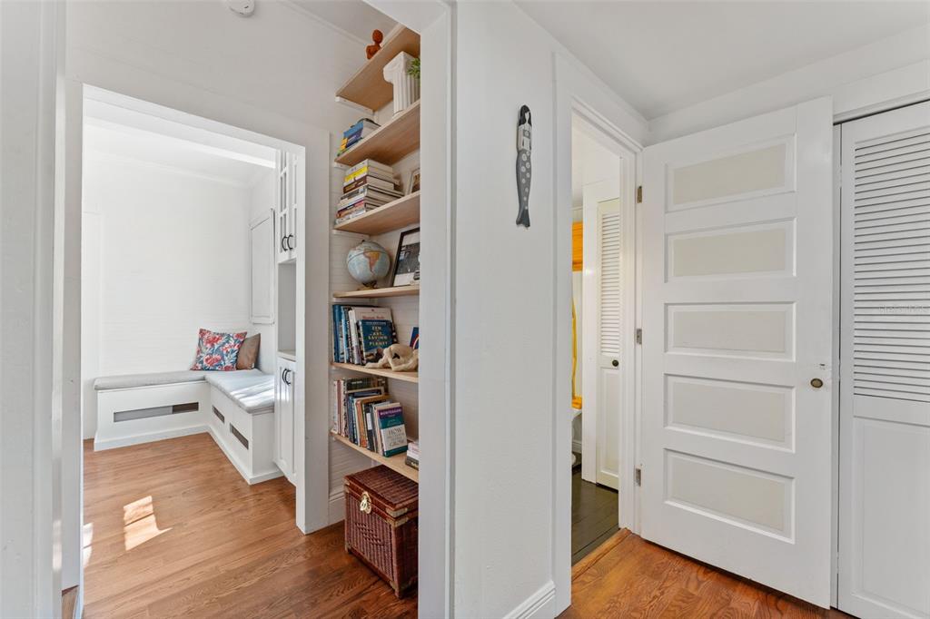 429 Scotland Street Dunedin, FL 34698 - Photo 31 of 78 a room with a wooden floor and white walls