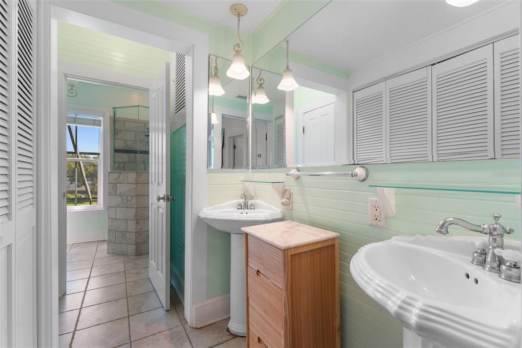 429 Scotland Street Dunedin, FL 34698 - Photo 40 of 78 a bathroom with a sink a toilet and shower