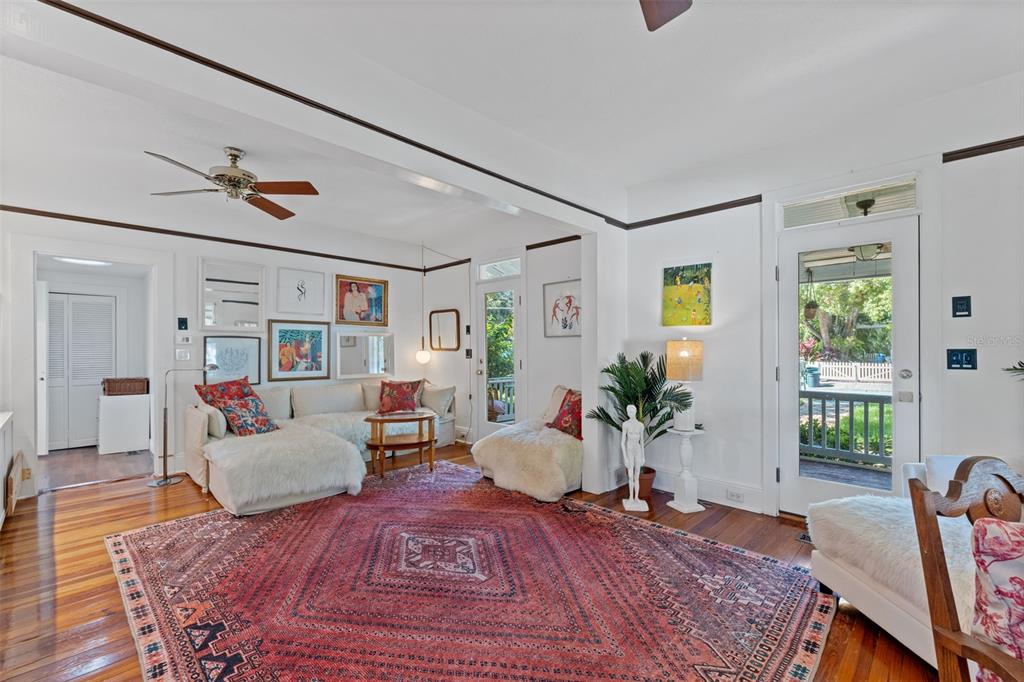 429 Scotland Street Dunedin, FL 34698 - Photo 4 of 78 a living room with furniture or couch and a potted plant