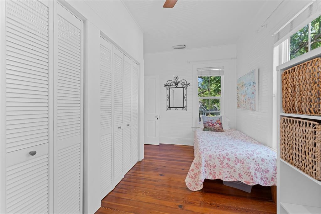 429 Scotland Street Dunedin, FL 34698 - Photo 48 of 78 a bedroom with a bed and a window