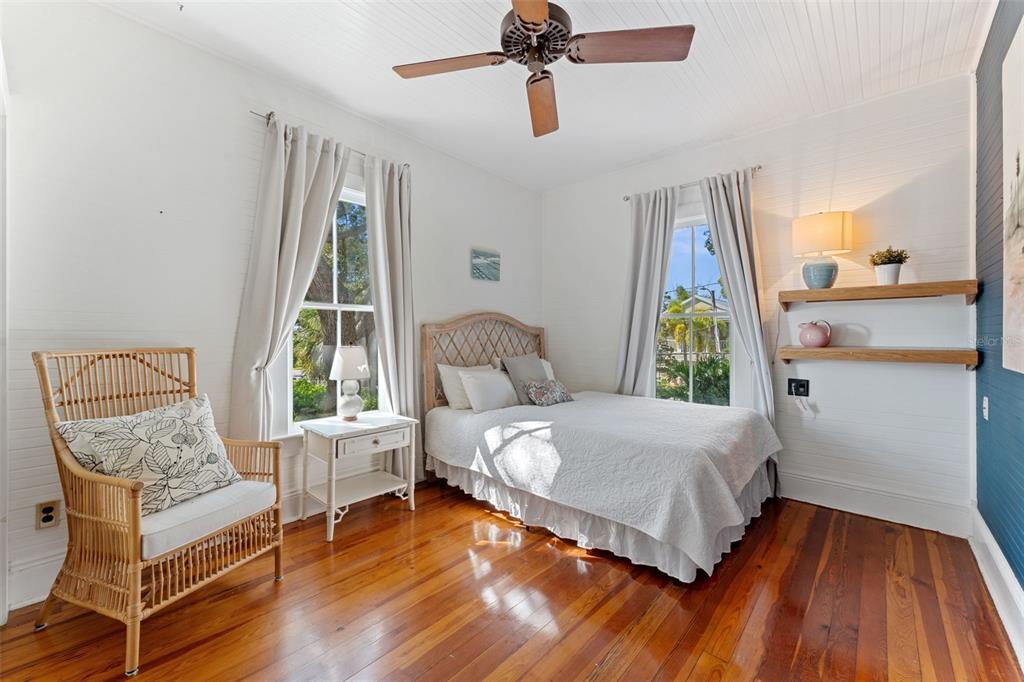 429 Scotland Street Dunedin, FL 34698 - Photo 49 of 78 a bedroom with a bed and a window