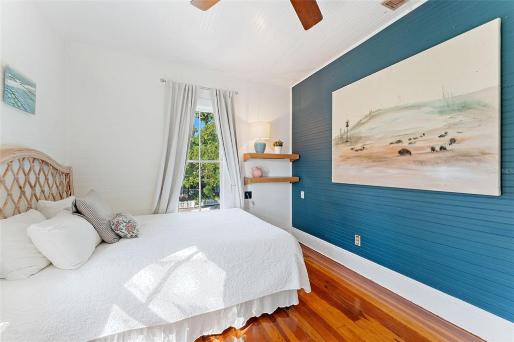 429 Scotland Street Dunedin, FL 34698 - Photo 51 of 78 a bedroom with a bed and window