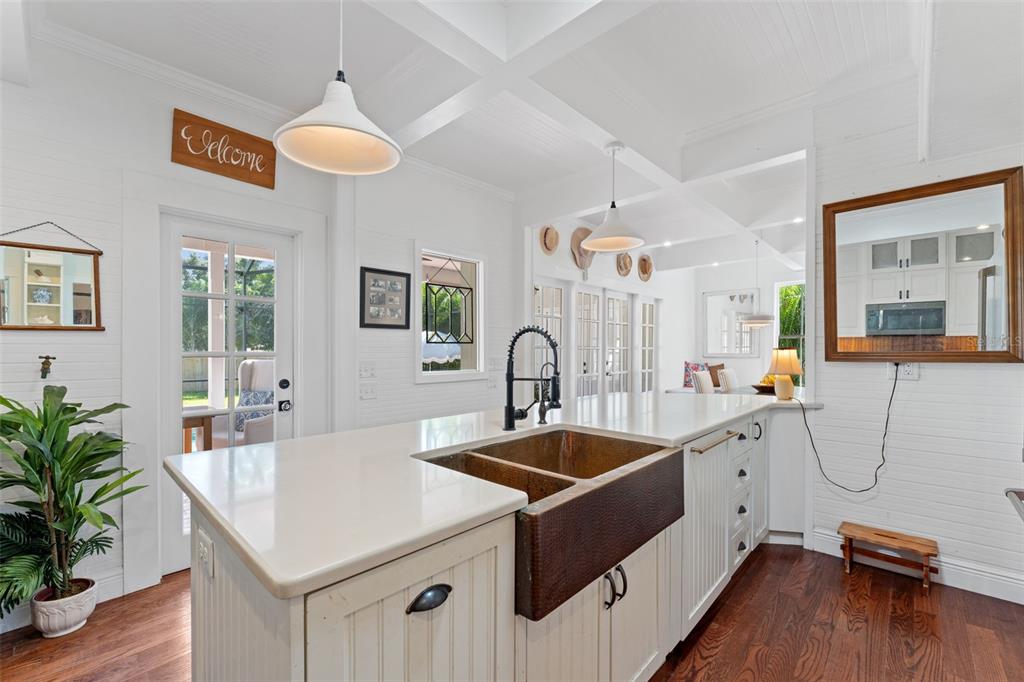 429 Scotland Street Dunedin, FL 34698 - Photo 10 of 78 a view of a kitchen with a sink and living room