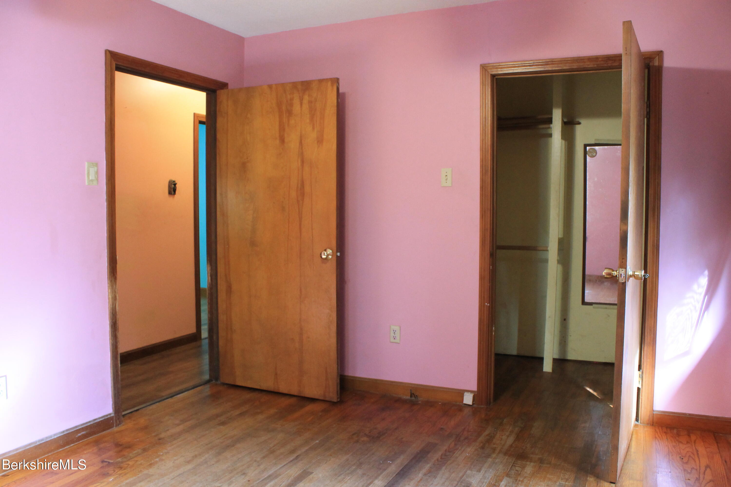 46 East Windsor Road Peru, MA 01235 - Photo 20 of 29 an empty room with wooden floor and closet