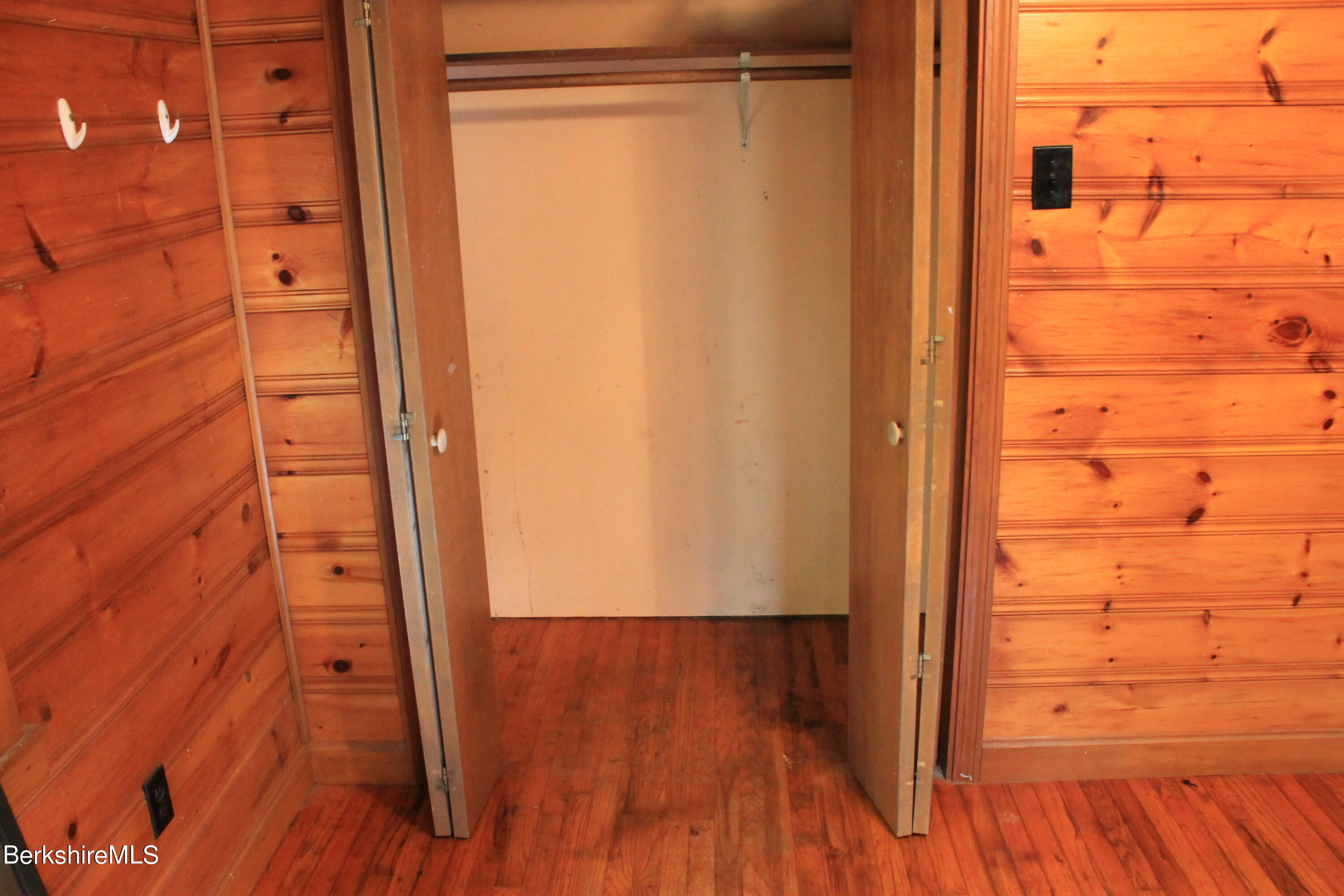 46 East Windsor Road Peru, MA 01235 - Photo 21 of 29 wooden floor with a glass door
