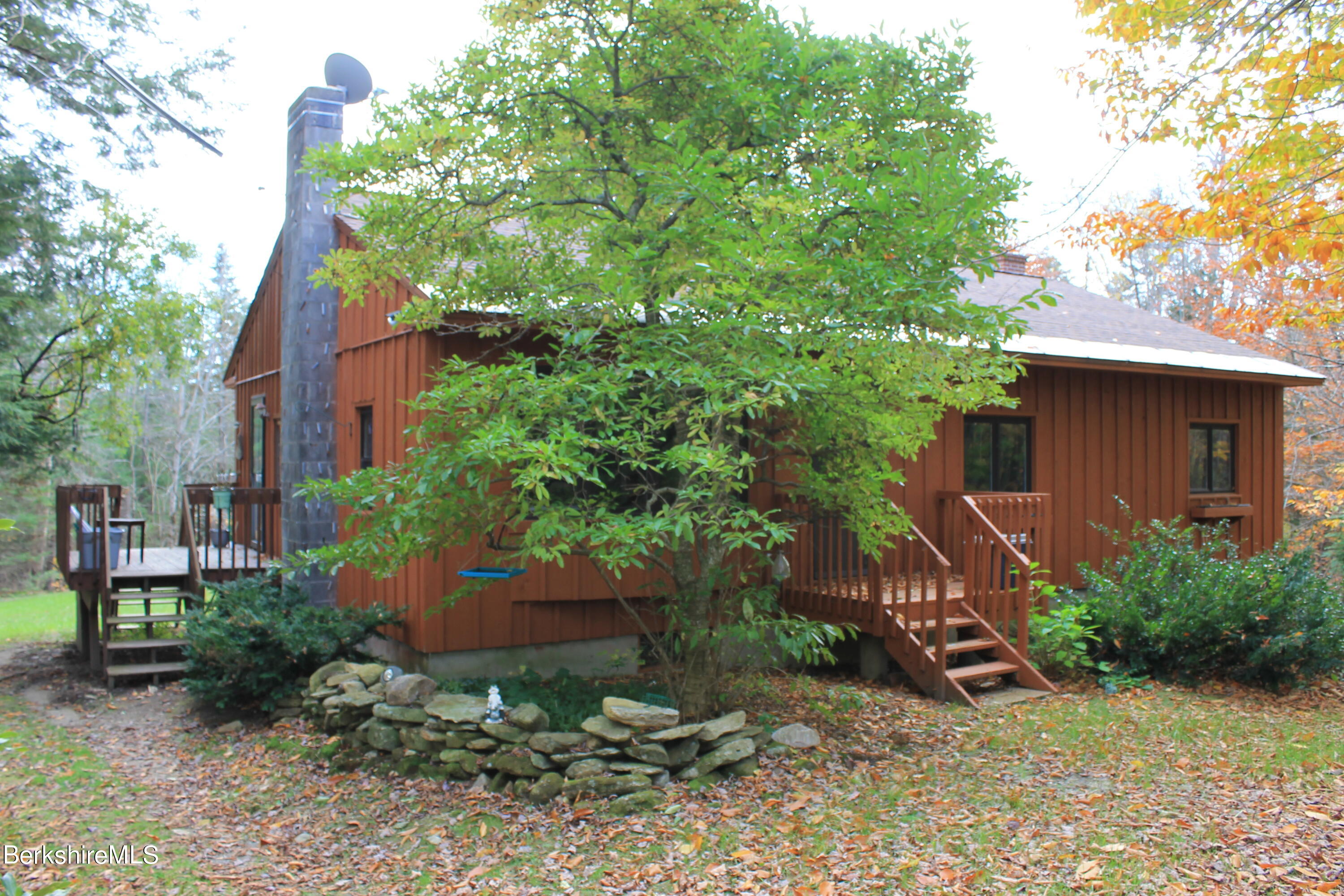 46 East Windsor Road Peru, MA 01235 - Photo 28 of 29 a view of a house with a yard and plants