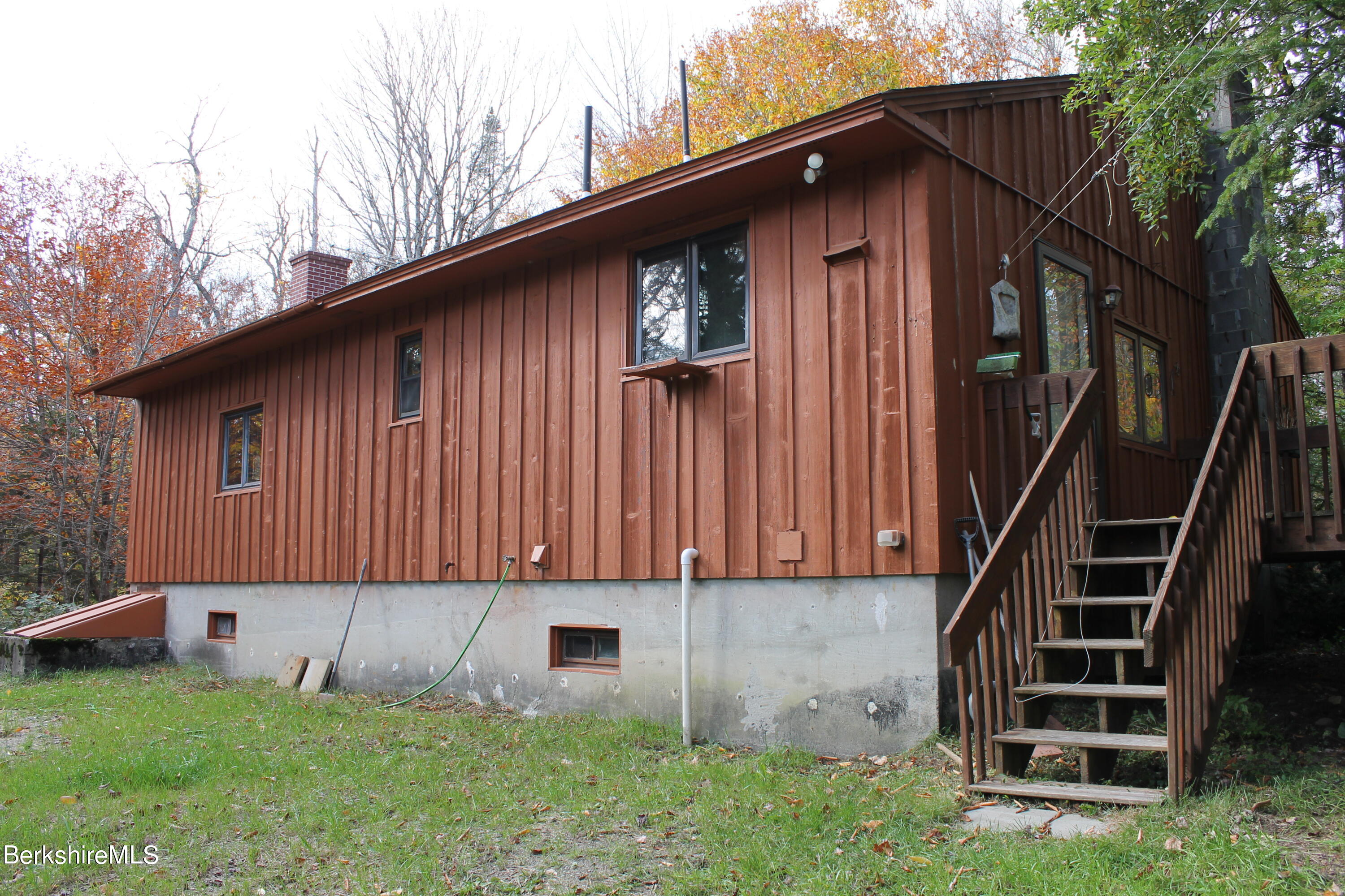 46 East Windsor Road Peru, MA 01235 - Photo 6 of 29 a front view of a house with garden