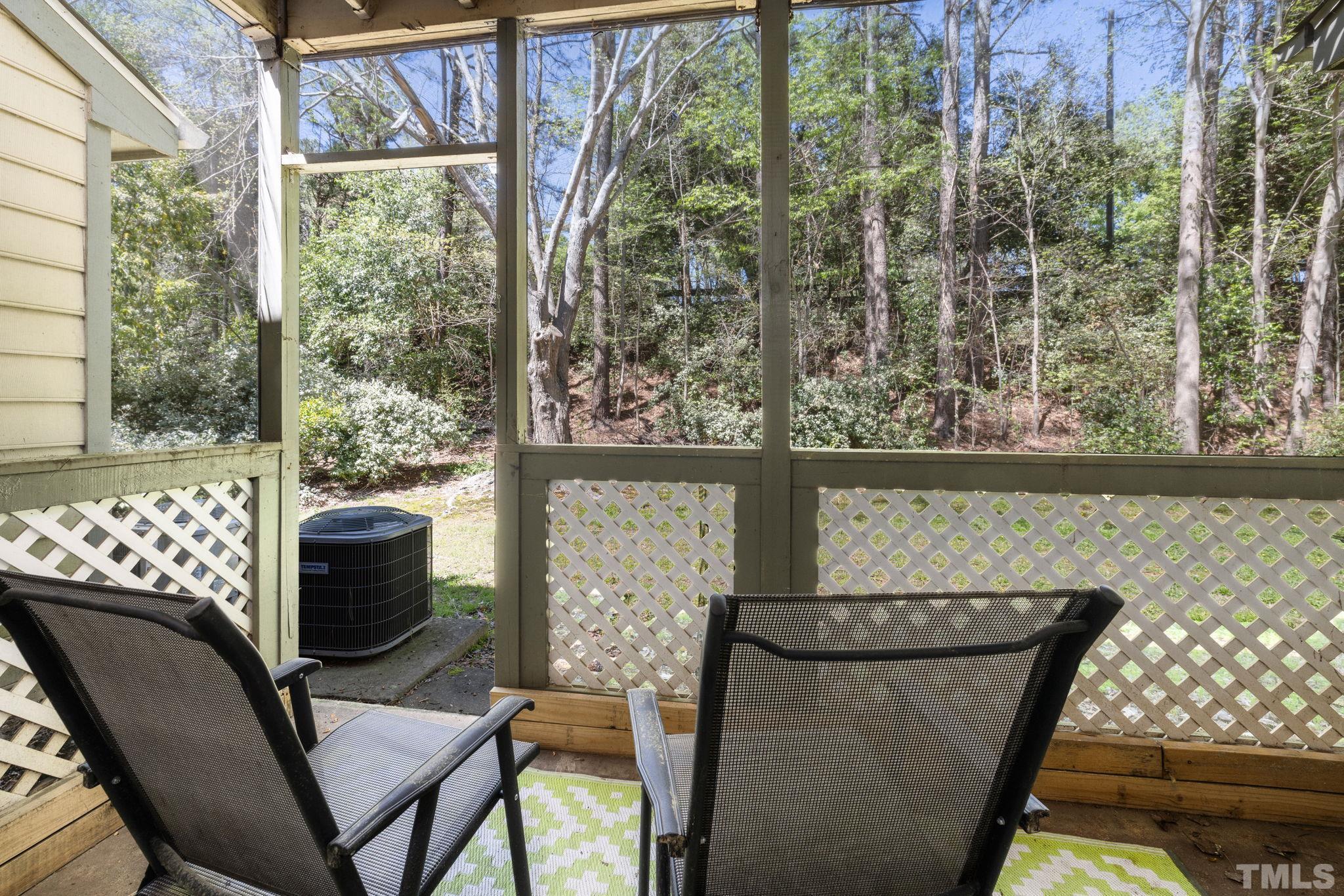 302 Broad Leaf Circle, Unit 302 Raleigh, NC 27613 - Photo 13 of 13 a balcony with table and chairs
