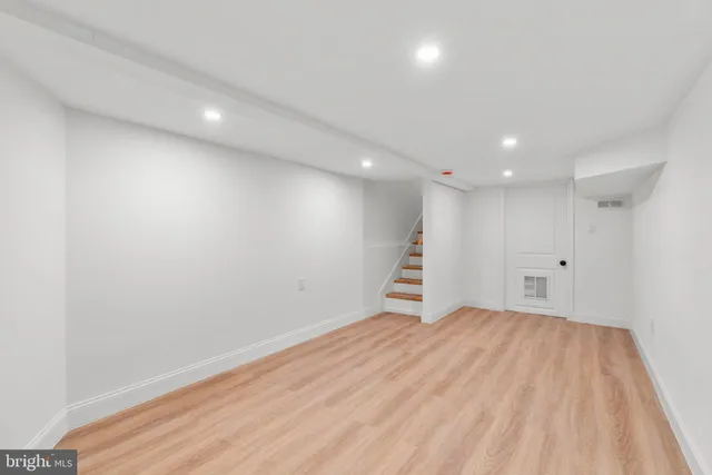 a view of a garage with wooden walls