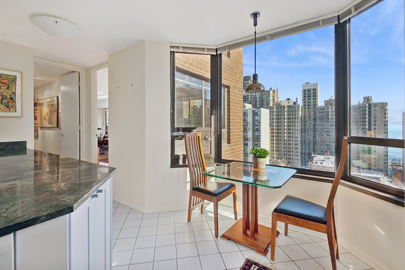 1410 North State Parkway, Unit 18B Chicago, IL 60610 - Photo 15 of 31 a dining room with furniture and window