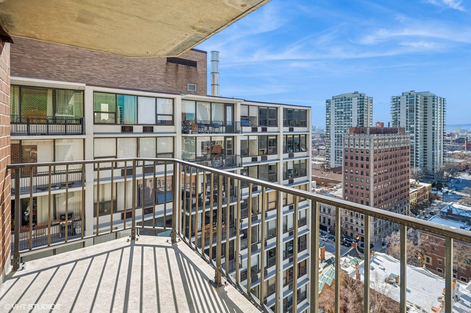1410 North State Parkway, Unit 18B Chicago, IL 60610 - Photo 17 of 31 a view of city from a balcony