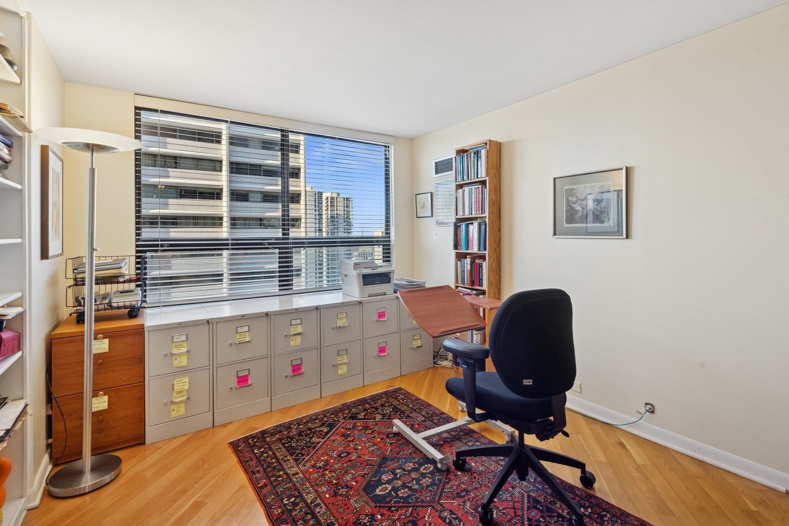 1410 North State Parkway, Unit 18B Chicago, IL 60610 - Photo 28 of 31 a workspace with furniture and a window