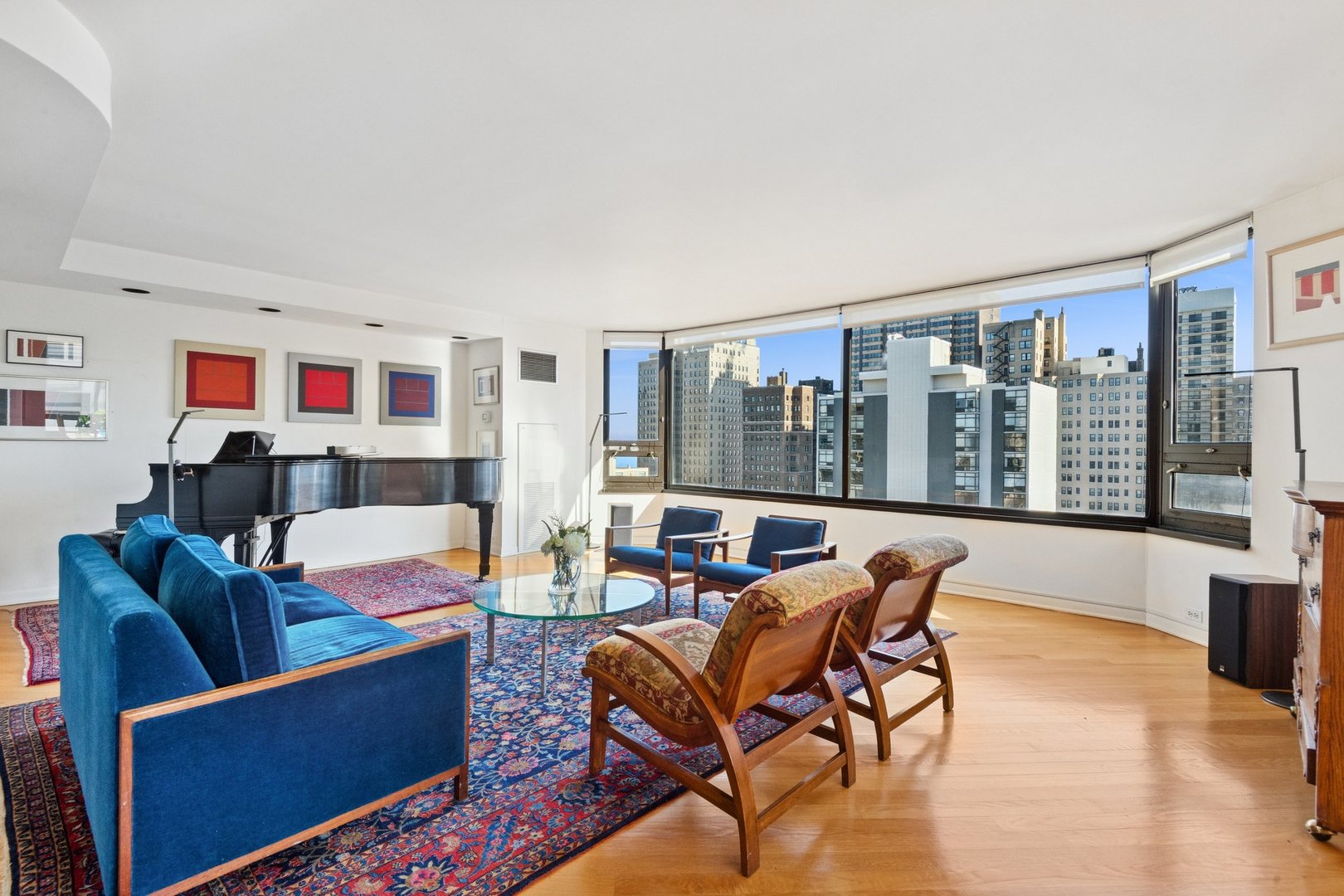 1410 North State Parkway, Unit 18B Chicago, IL 60610 - Photo 5 of 31 a living room with furniture and a large window