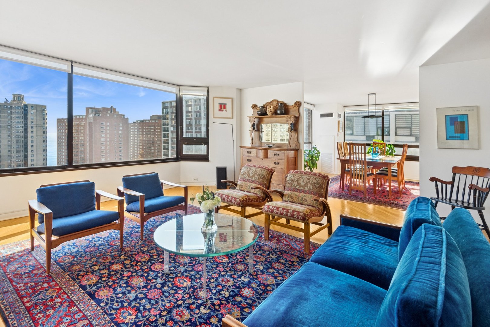 1410 North State Parkway, Unit 18B Chicago, IL 60610 - Photo 7 of 31 a living room with furniture and a floor to ceiling window
