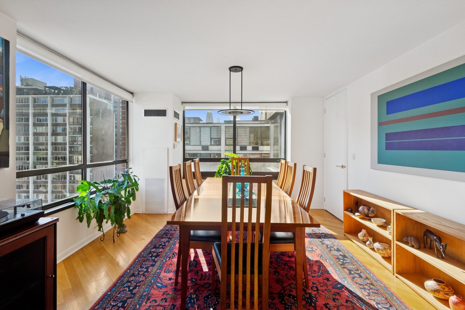 1410 North State Parkway, Unit 18B Chicago, IL 60610 - Photo 8 of 31 a view of a dining room with furniture window and wooden floor
