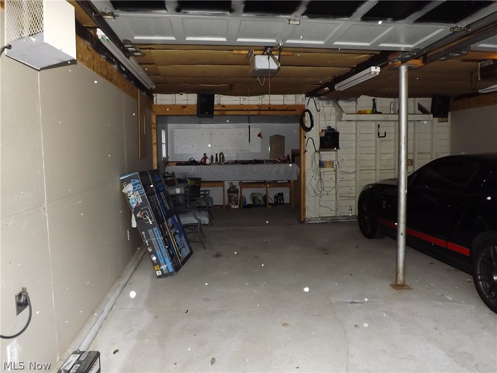 3325 Ralph Avenue Cleveland, OH 44109 - Photo 11 of 14 2 car garage with work room and loft; ceiling high enough for large pick-up truck; heat & electricity