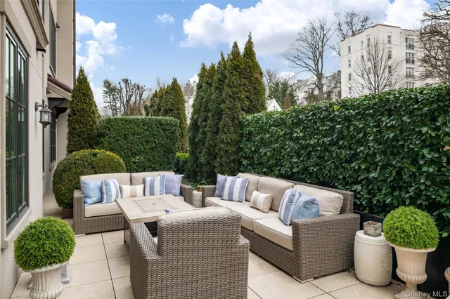 a view of a patio in the backyard