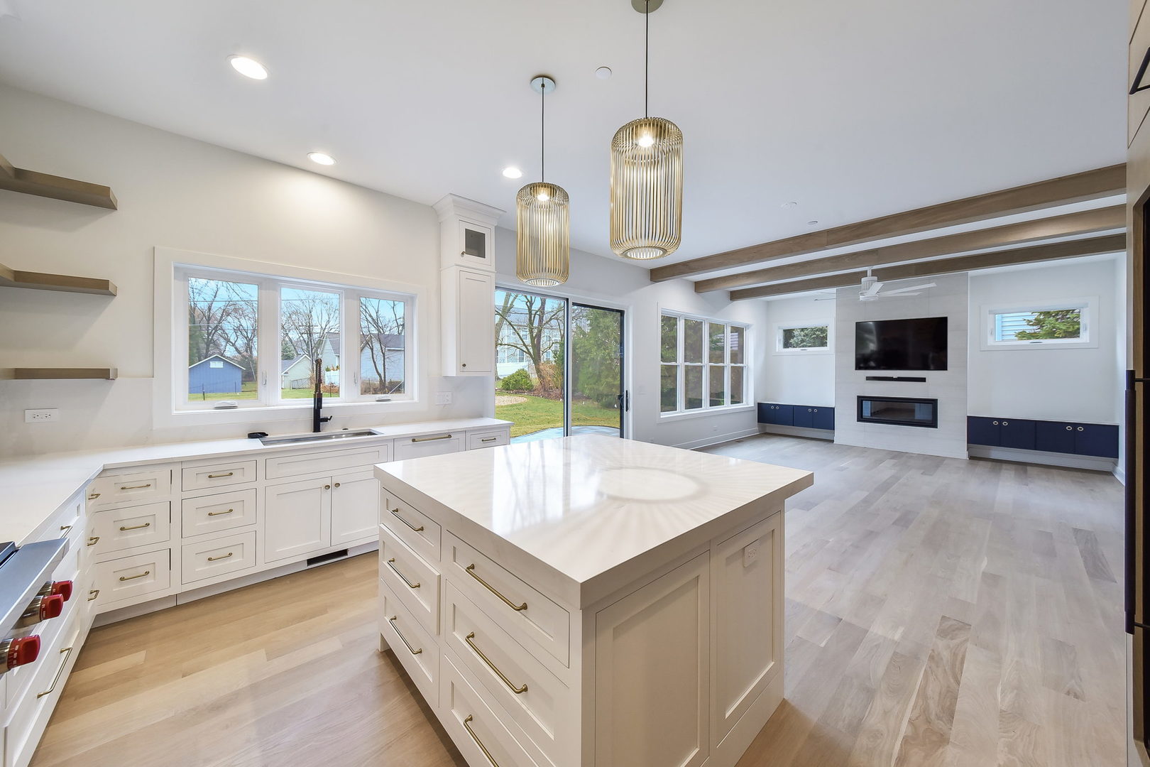 28W165 Geneva Road West Chicago, IL 60185 - Photo 3 of 18 a large kitchen with kitchen island a sink stainless steel appliances and cabinets