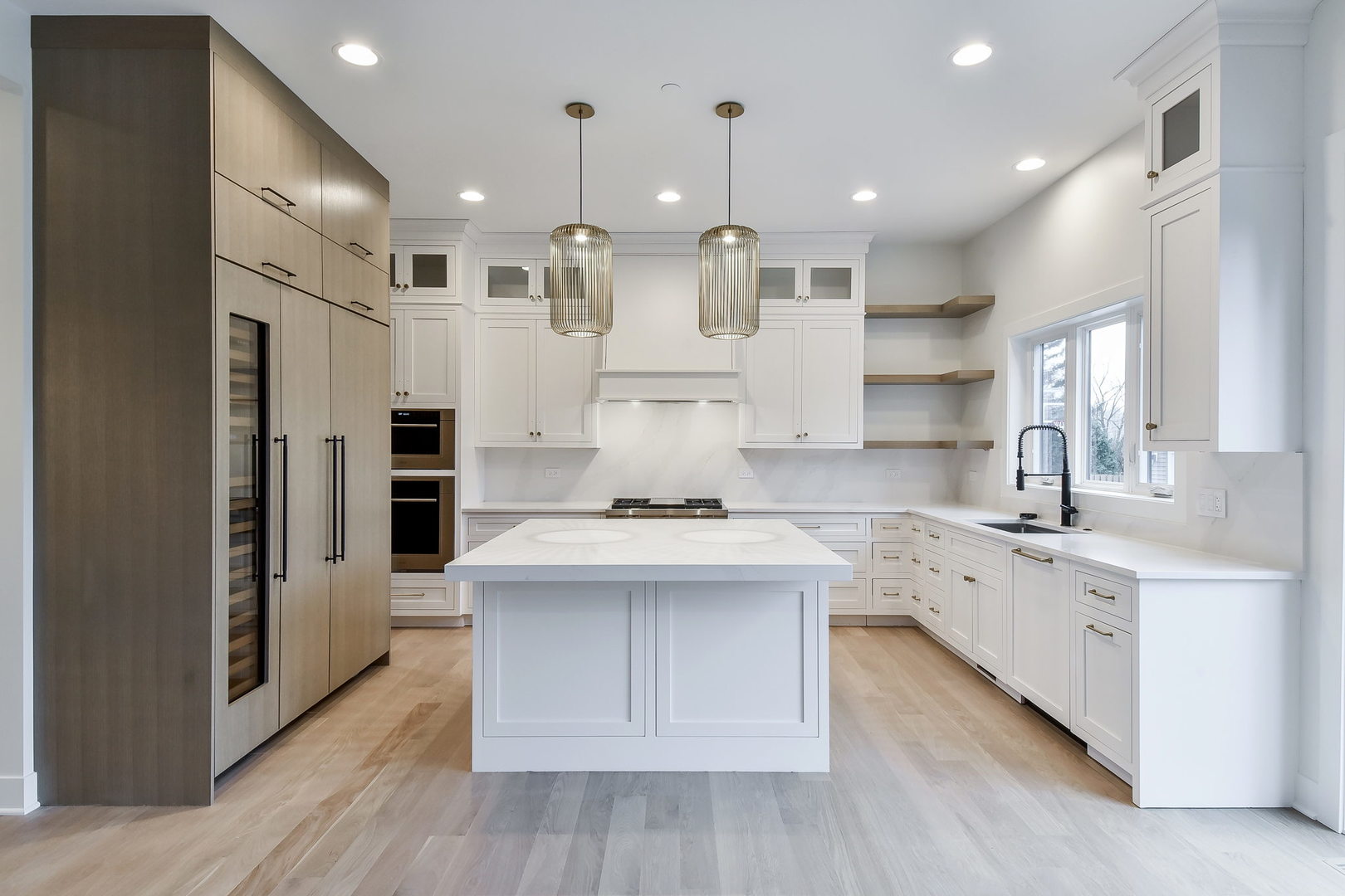 28W165 Geneva Road West Chicago, IL 60185 - Photo 4 of 18 a large kitchen with stainless steel appliances kitchen island granite countertop a large counter top and a stove