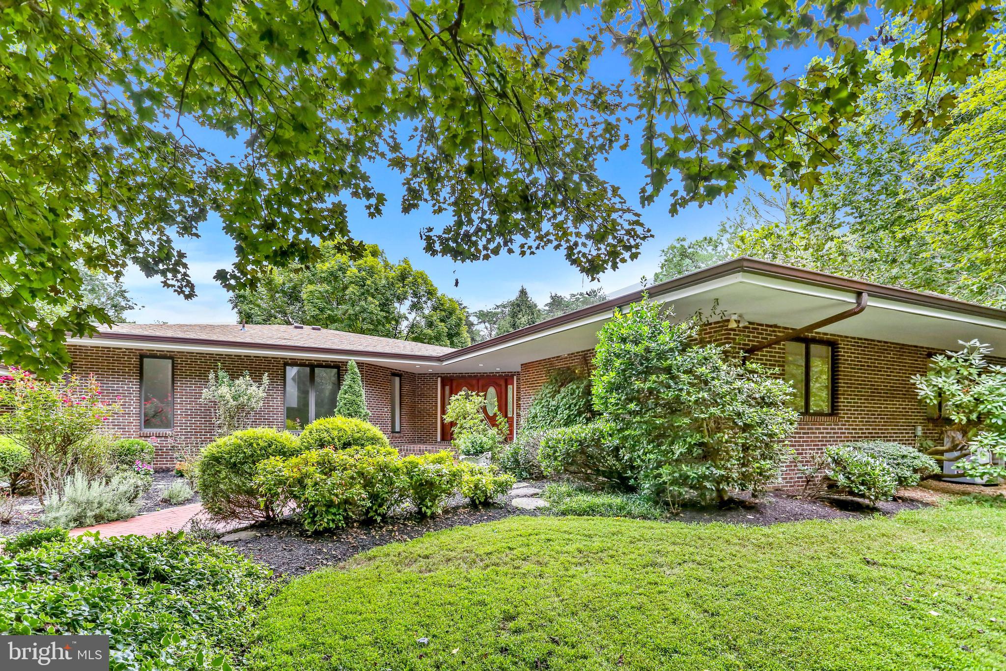 2033 Hunter Mill Road Vienna, VA 22181 - Photo 1 of 5 front view of a house with a yard