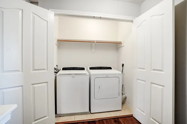 a utility room with dryer and washer