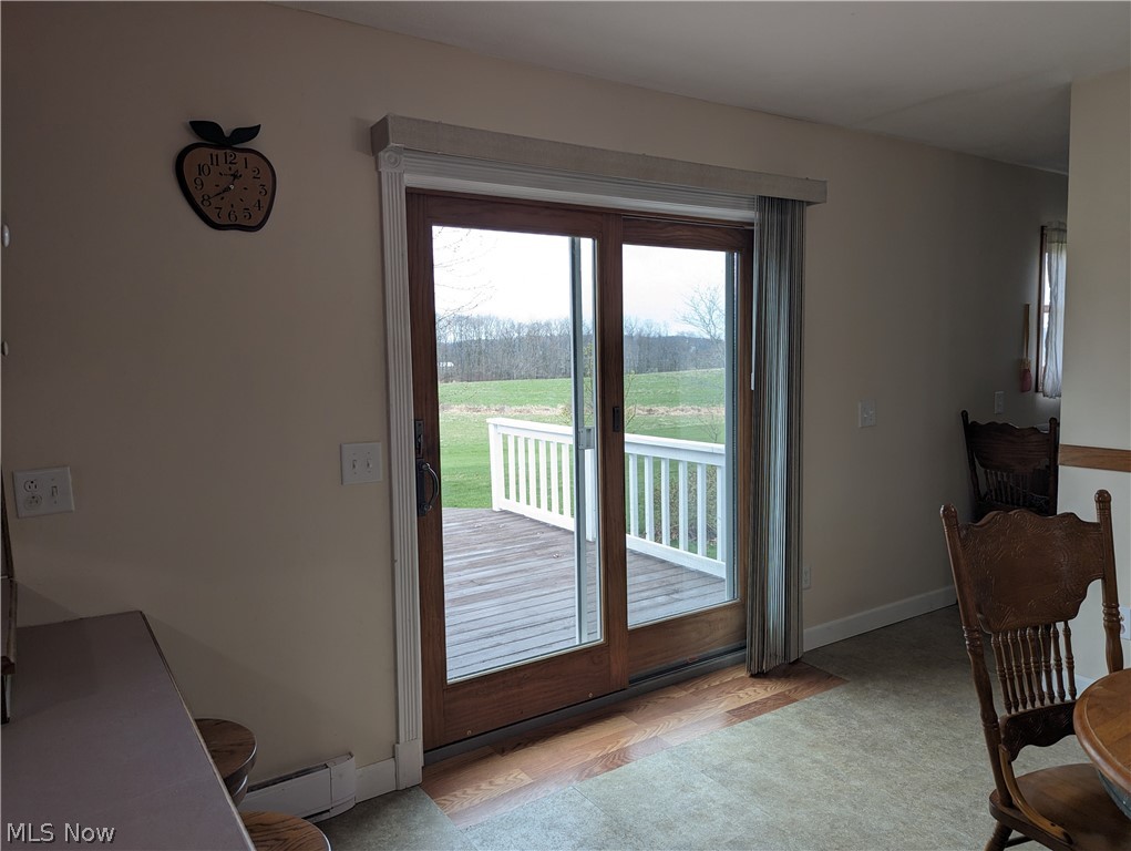 6333 Rochester Road East Rochester, OH 44625 - Photo 28 of 47 Patio door off dining room to back deck
