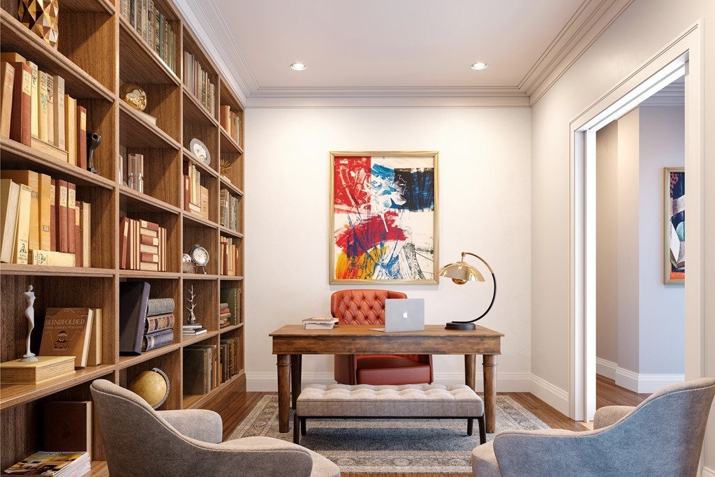 4 Joy Street, Unit II Boston, MA 02108 - Photo 6 of 7 a view of a livingroom with furniture and book shelf