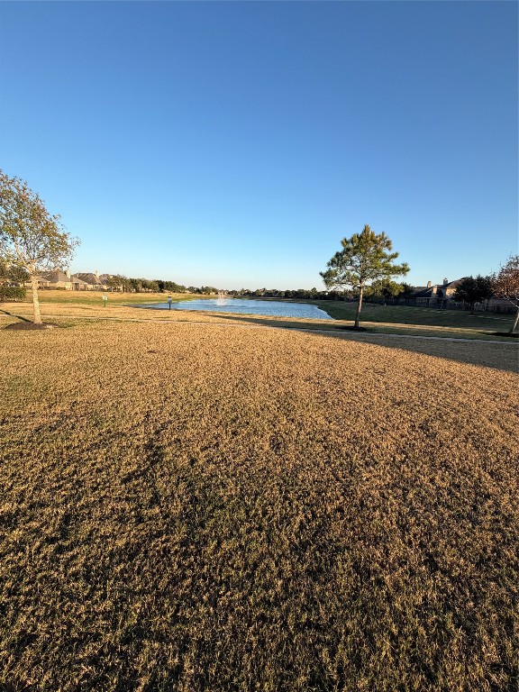 507 Summer Arbor Circle Rosenberg, TX 77469 - Photo 29 of 29 Lake with sidewalk