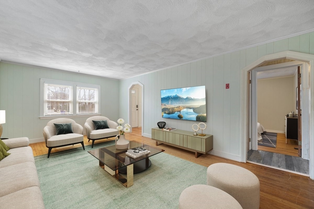 84 East Shore Road Holbrook, MA 02343 - Photo 5 of 26 a living room with furniture and a couch