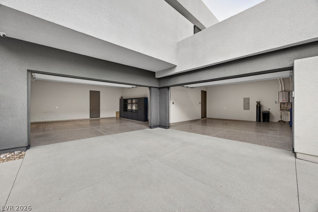 1456 Solitude Ridge Drive Henderson, NV 89012 - Photo 14 of 94 4 Car Garage with 1 Tesla & 1 EV Charger