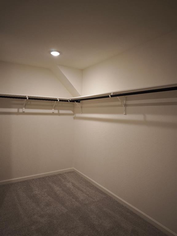 2111 Burnwood Street Melissa, TX 75454 - Photo 9 of 18 a view of a room with racks on the wall